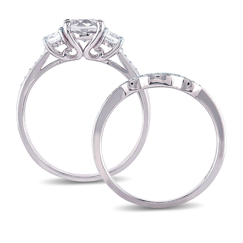 6.0mm White Sapphire and 1/8 CT. T.W. Diamond Three Stone Bridal Set in 10K White Gold
