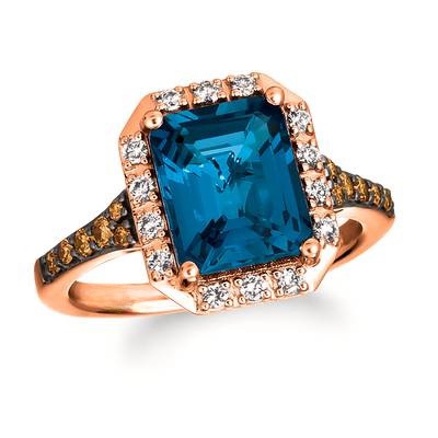Ringfeaturing31/2cts.DeepSeaBlueTopaz,1/5cts.ChocolateDiamonds,1/5cts.NudeDiamondssetin14KStrawberryGold