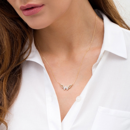1/8 CT. T.W. Diamond Symbol Necklace in 10K Gold:1/8 CT. T.W. Diamond Symbol Necklace in 10K Gold